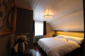 Voodi või voodid majutusasutuse Hotel Limmatblick toas
