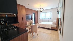 Kuchyň nebo kuchyňský kout v ubytování Green Suites Tunis