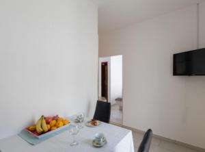 TV a/nebo společenská místnost v ubytování Apartments Ane