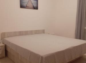 Postel nebo postele na pokoji v ubytování Apartments Ane