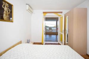 Postel nebo postele na pokoji v ubytování Apartments Ane