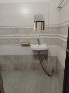 Ένα μπάνιο στο Aman Guest House