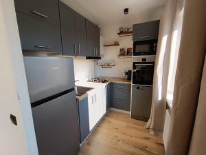 Kuchyň nebo kuchyňský kout v ubytování Jõhvi Home