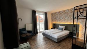 Voodi või voodid majutusasutuse Hotel Siebeneichen toas