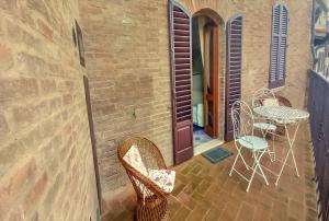 Billede fra billedgalleriet på Casa nella Corte nel Centro di San Gimignano con balcone panoramico wifi e garage auto privato i San Gimignano