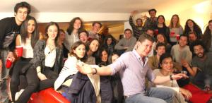 a large group of people in a room at We Love F Tourists in Lisbon
