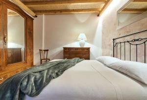 Ένα ή περισσότερα κρεβάτια σε δωμάτιο στο casa “La Contrada” +5 φωτογραφίες