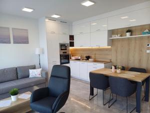 Η κουζίνα ή μικρή κουζίνα στο Villapark Apartman G3
