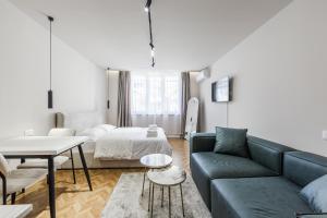 Ένα ή περισσότερα κρεβάτια σε δωμάτιο στο Cozy Studio - Serenitas 2