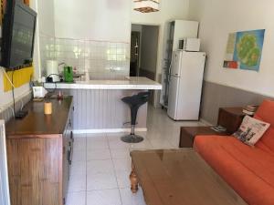 Kuchyň nebo kuchyňský kout v ubytování Appartement LETCHIS MANGUE