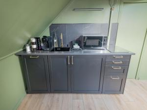 Køkken eller tekøkken på La Suite Jungle - l'expérience immersive + 7 billeder