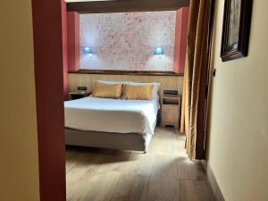 Postel nebo postele na pokoji v ubytování Hotel Pinomar + 37 fotografií
