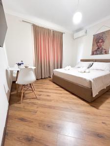 Postel nebo postele na pokoji v ubytování Villa Reve de Tirana