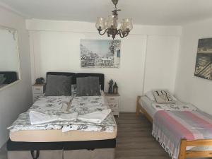 Postel nebo postele na pokoji v ubytování B&B Apartments Coli Apartman Dora Self check in