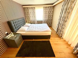 Postelja oz. postelje v sobi nastanitve Seiler's Hotel