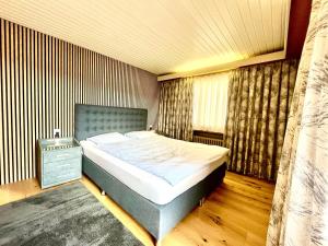 Postelja oz. postelje v sobi nastanitve Seiler's Hotel
