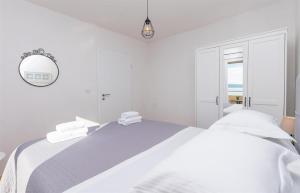 Posteľ alebo postele v izbe v ubytovaní Apartments Marijo