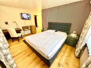 Postelja oz. postelje v sobi nastanitve Seiler's Hotel