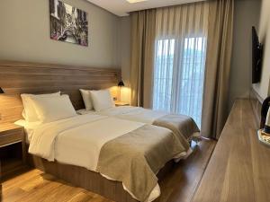 Postel nebo postele na pokoji v ubytování Viola Hotel Budva + 37 fotografií