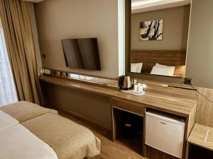 Postel nebo postele na pokoji v ubytování Viola Hotel Budva