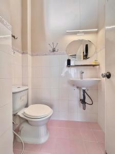 Koupelna v ubytování BÊ TÔNG RESIDENCES HOMESTAY