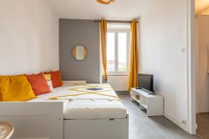 Ένα ή περισσότερα κρεβάτια σε δωμάτιο στο Superbe studio Nantes-Centre Gare