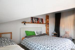 Postel nebo postele na pokoji v ubytování CN004 - Cesenatico, nuovo attico con terrazza e vasca idromassaggio