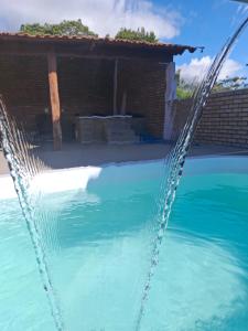 A piscina localizada em Chalé dos Campos ou nos arredores
