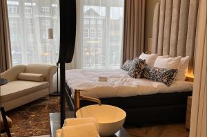 Ένα ή περισσότερα κρεβάτια σε δωμάτιο στο Boutique Hotel Jersey