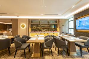 Restaurace v ubytování Echarm Plus International Hotel Ouzhuang Metro Station Branch - Free Deliver Service to Canton Fair Complex During Canton Fair Period