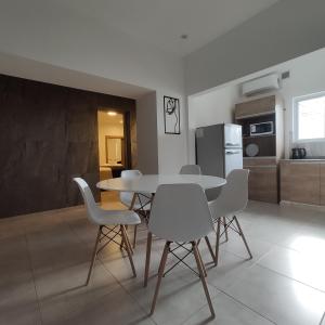 Køkken eller tekøkken på Departamentos Arenales + 9 billeder