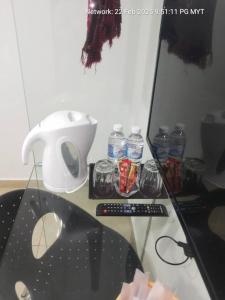 Příslušenství pro přípravu čaje a kávy v ubytování ONE AMPANG HOTEL + 9 fotografií
