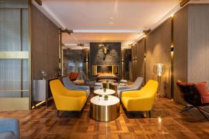Posezení v ubytování Echarm Plus International Hotel Ouzhuang Metro Station Branch - Free Deliver Service to Canton Fair Complex During Canton Fair Period
