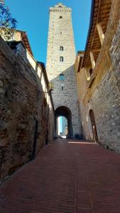 Billede fra billedgalleriet på Casa nella Corte nel Centro di San Gimignano con balcone panoramico wifi e garage auto privato i San Gimignano + 18 billeder