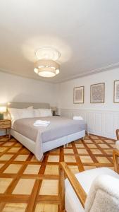 Postel nebo postele na pokoji v ubytování Cosy Suite