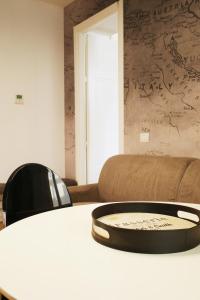 Posezení v ubytování PORTA NUOVA SUITES
