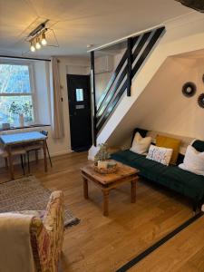 Posezení v ubytování Kolly Cottage