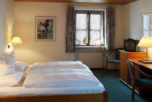 Postel nebo postele na pokoji v ubytování Boardinghouse Wadenspanner