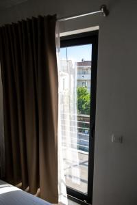 Ένα ή περισσότερα κρεβάτια σε δωμάτιο στο Apartments Bella Notte