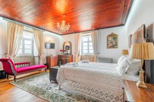 Ένα ή περισσότερα κρεβάτια σε δωμάτιο στο Quinta de Malta +181 φωτογραφίες