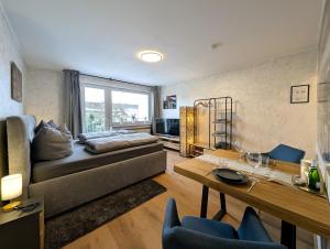 Posezení v ubytování H-Aparts Essen - TOP Apartments in Best-Lage