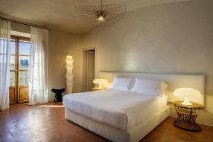 Postel nebo postele na pokoji v ubytování Casa Ruffino - Wine Relais