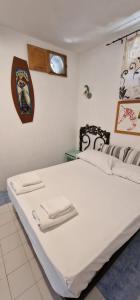 Una cama o camas en una habitación de Nicaredda