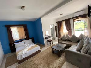 Postel nebo postele na pokoji v ubytování Hotel Chaouen