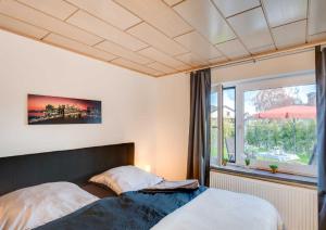 Postel nebo postele na pokoji v ubytování WS Ferienwohnung Strand