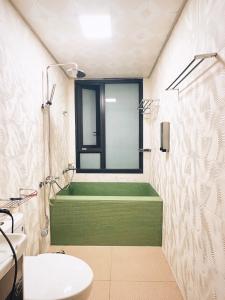 Bilik mandi di 禾夏民宿Her Shot Inn +36 gambar
