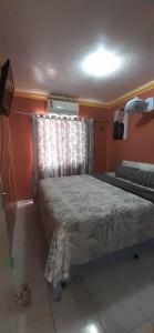 En eller flere senge i et værelse på Apto