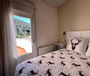 A bed or beds in a room at Alojamientos Rurales Cuatro Estaciones