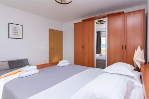 Posteľ alebo postele v izbe v ubytovaní Apartments Marijo