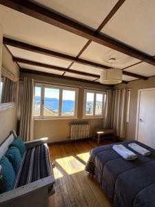 Postel nebo postele na pokoji v ubytování Bariloche Hostel